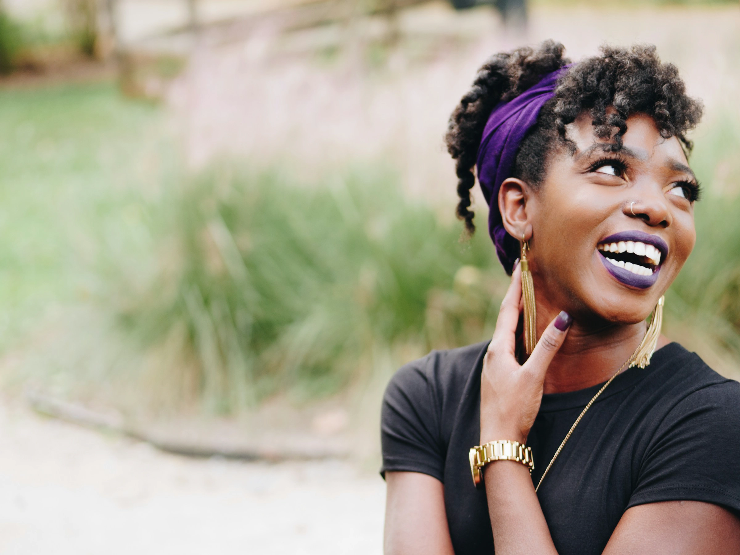 A woman smiling with pearly white teeth